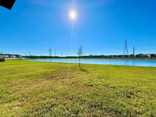 a view of an ocean and city
