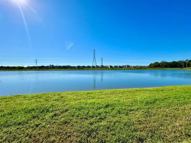 a view of a lake with a city view