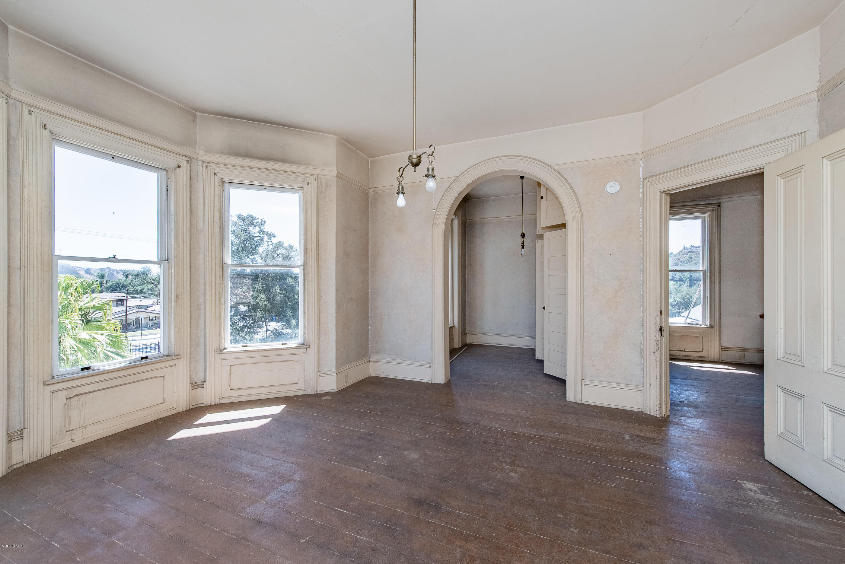 1226 Ojai Road Santa Paula, CA 93060 - Photo 27 of 73 a view of empty room with window and wooden floor