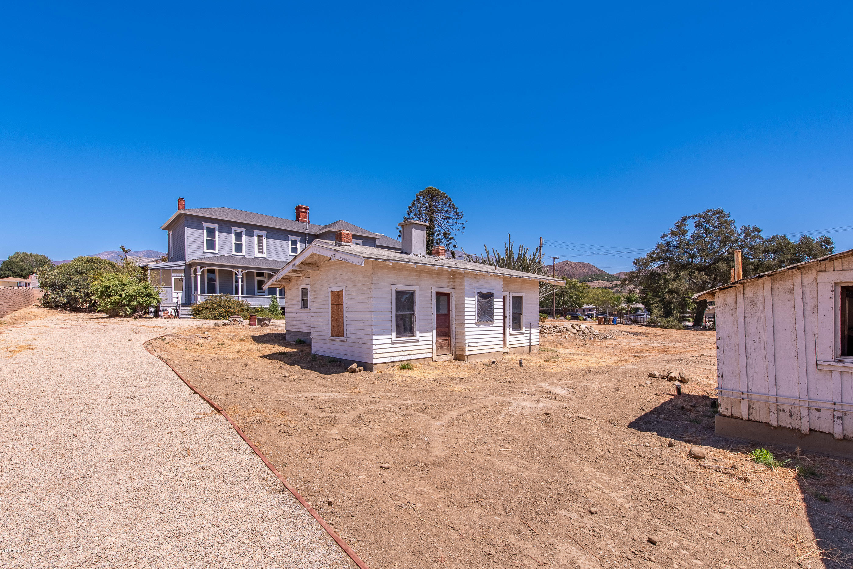 1226 Ojai Road Santa Paula, CA 93060 - Photo 50 of 73 a front view of a house with a yard