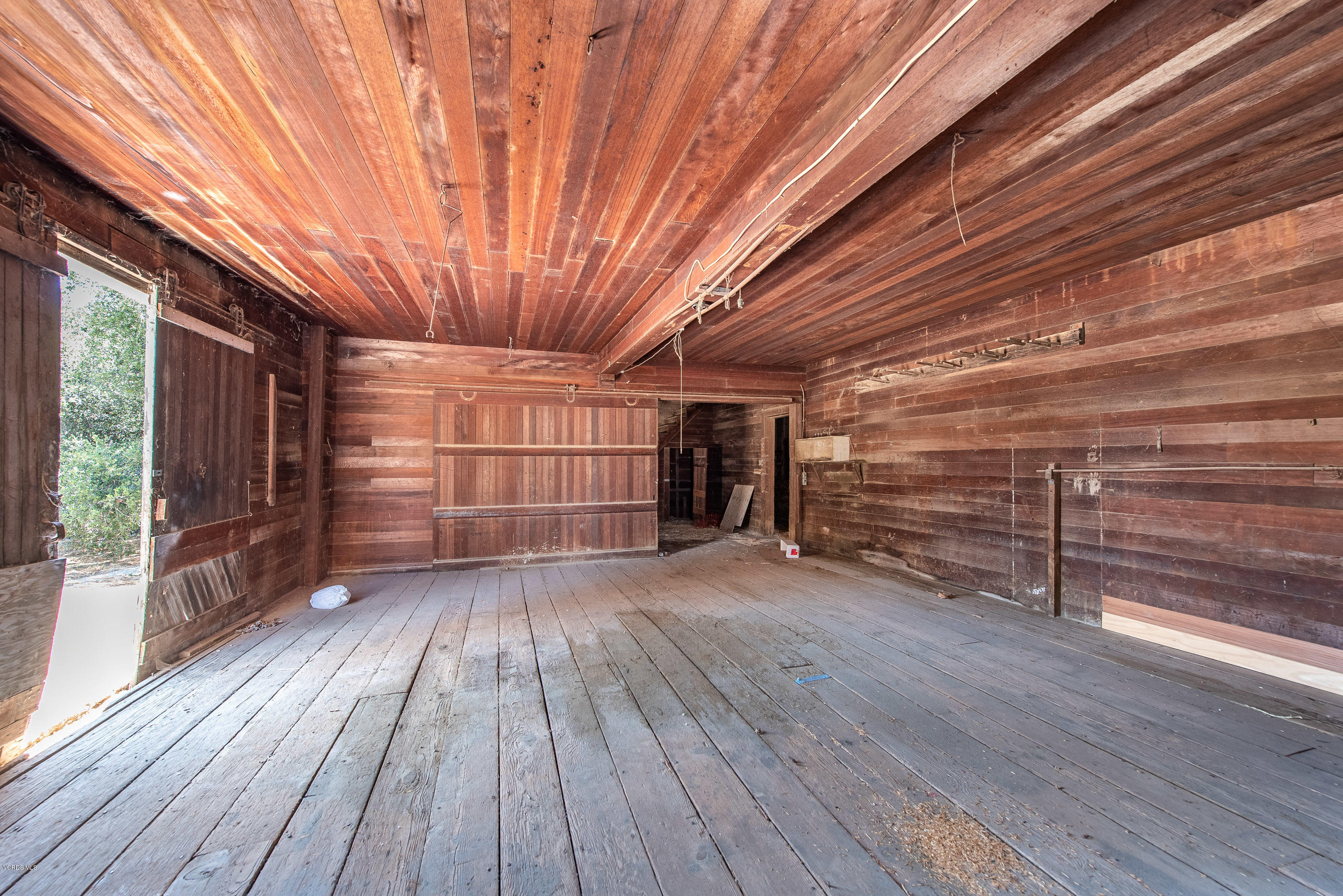 1226 Ojai Road Santa Paula, CA 93060 - Photo 52 of 73 a view of empty room with wooden floor