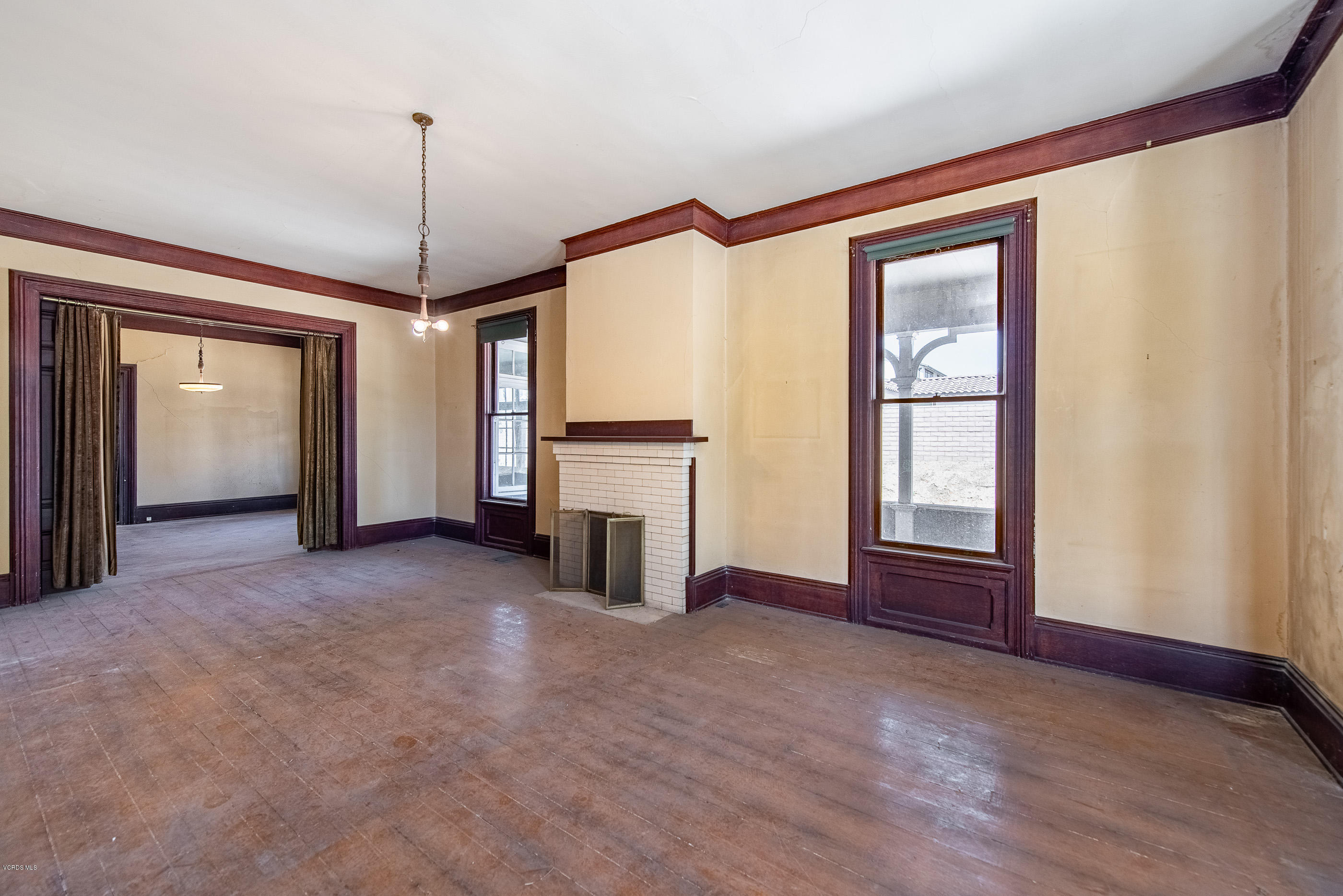 1226 Ojai Road Santa Paula, CA 93060 - Photo 10 of 73 a view of empty room with fireplace and fan