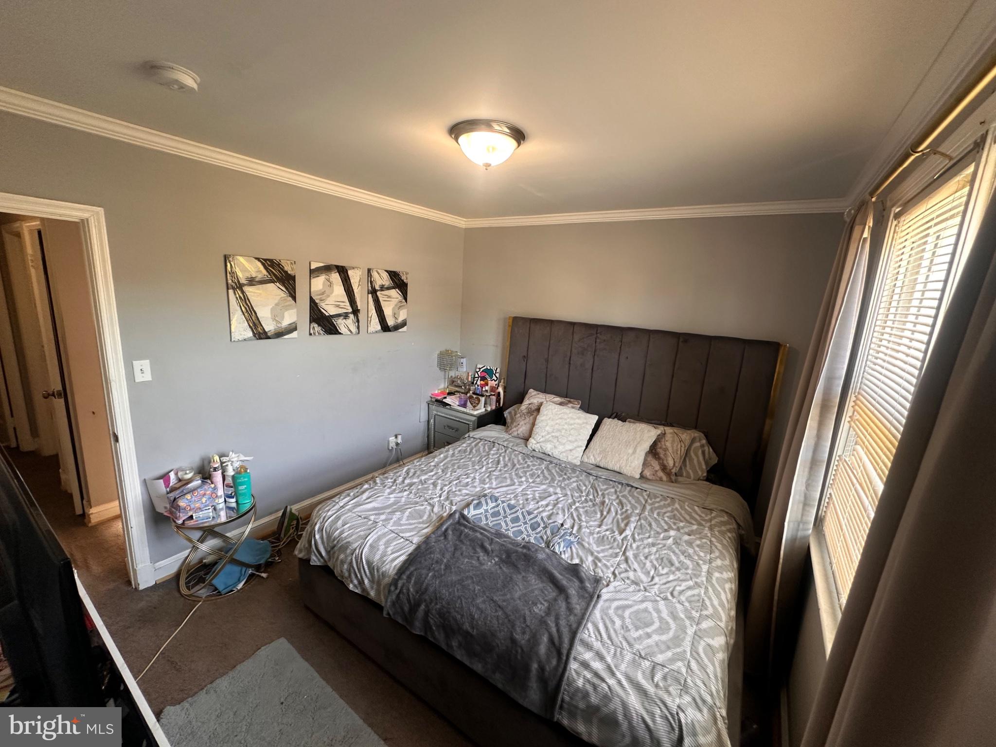 2725 North Rosedale Street Baltimore, MD 21216 - Photo 14 of 21 Cozy bedroom with modern accents.