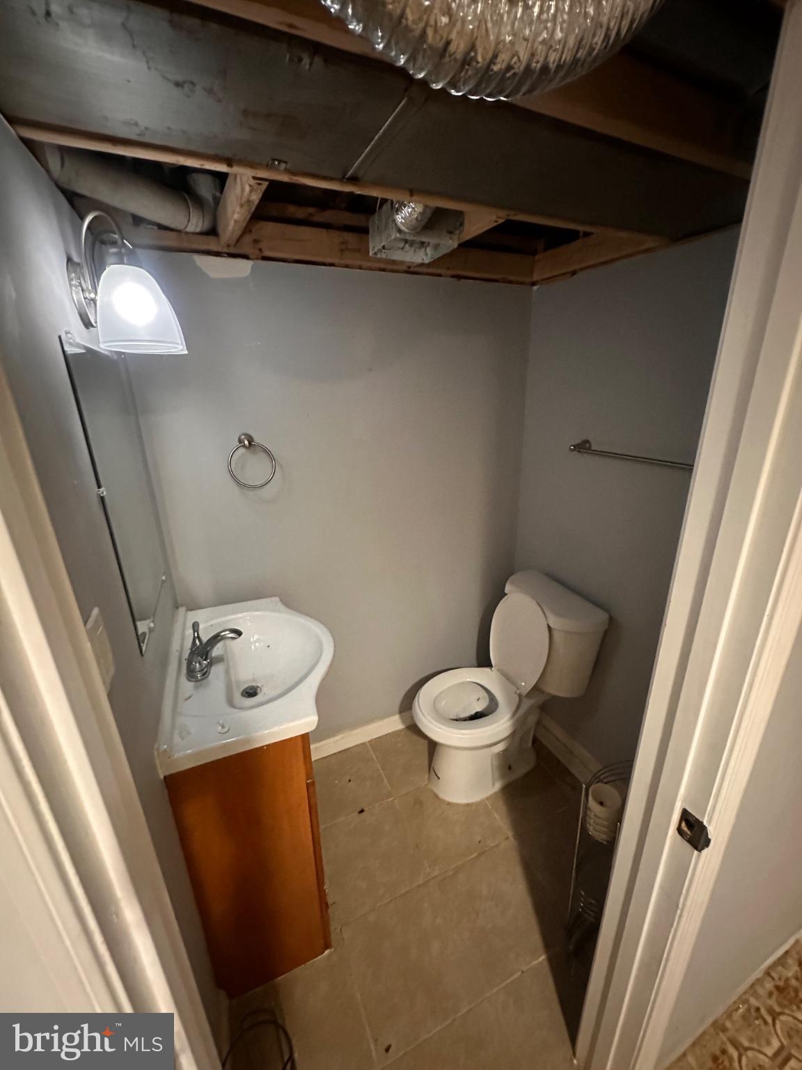 2725 North Rosedale Street Baltimore, MD 21216 - Photo 17 of 21 Compact bathroom with modern fixtures.