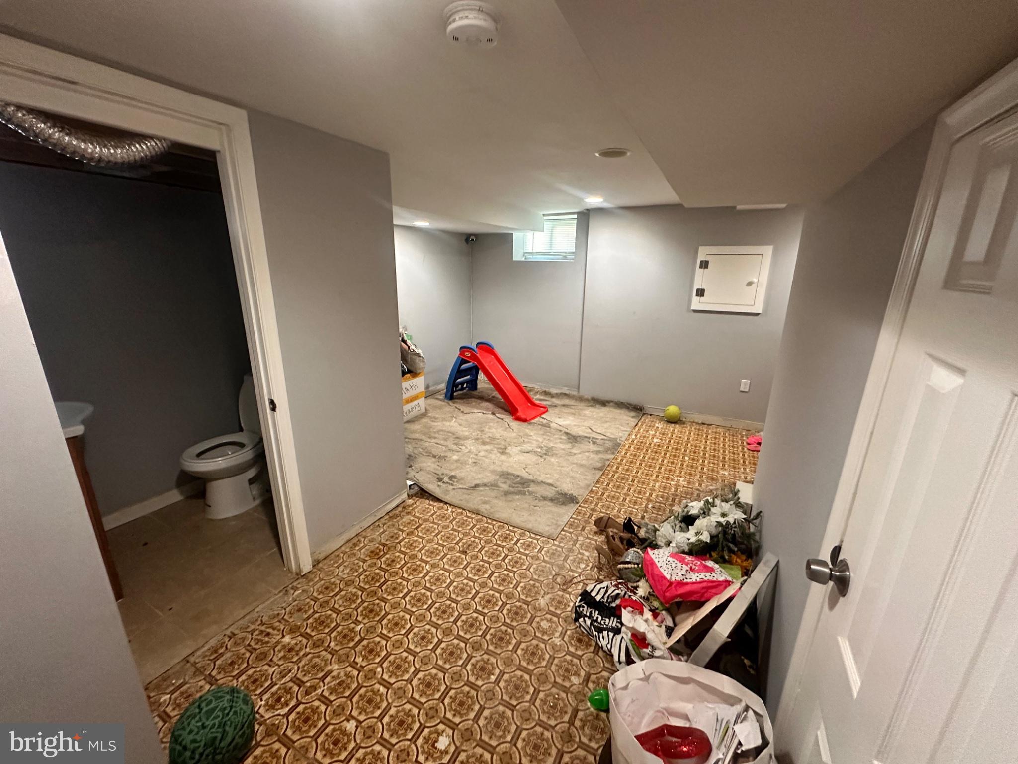 2725 North Rosedale Street Baltimore, MD 21216 - Photo 18 of 21 Spacious basement with playful potential.