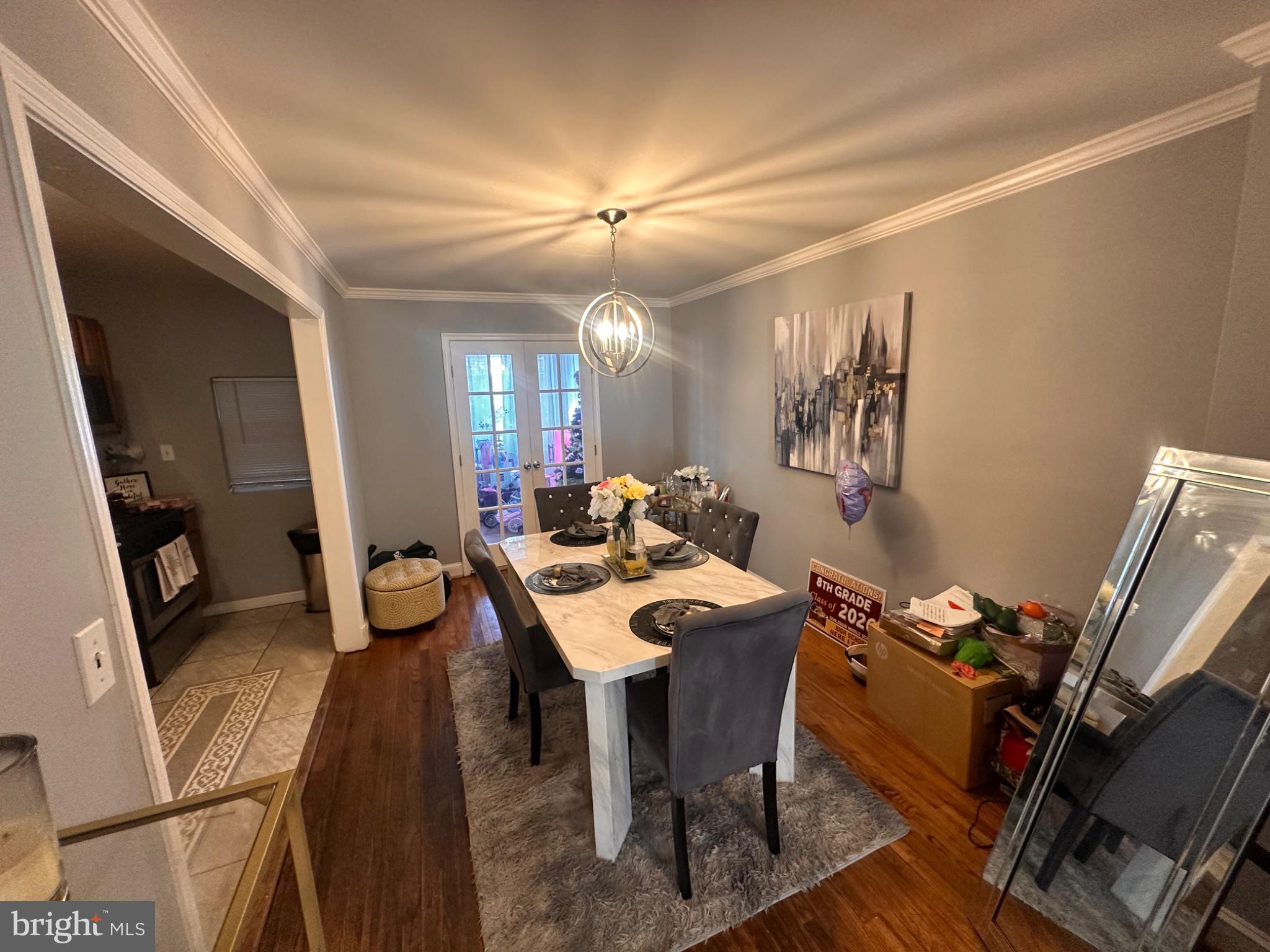 2725 North Rosedale Street Baltimore, MD 21216 - Photo 6 of 21 Charming dining space with modern flair.