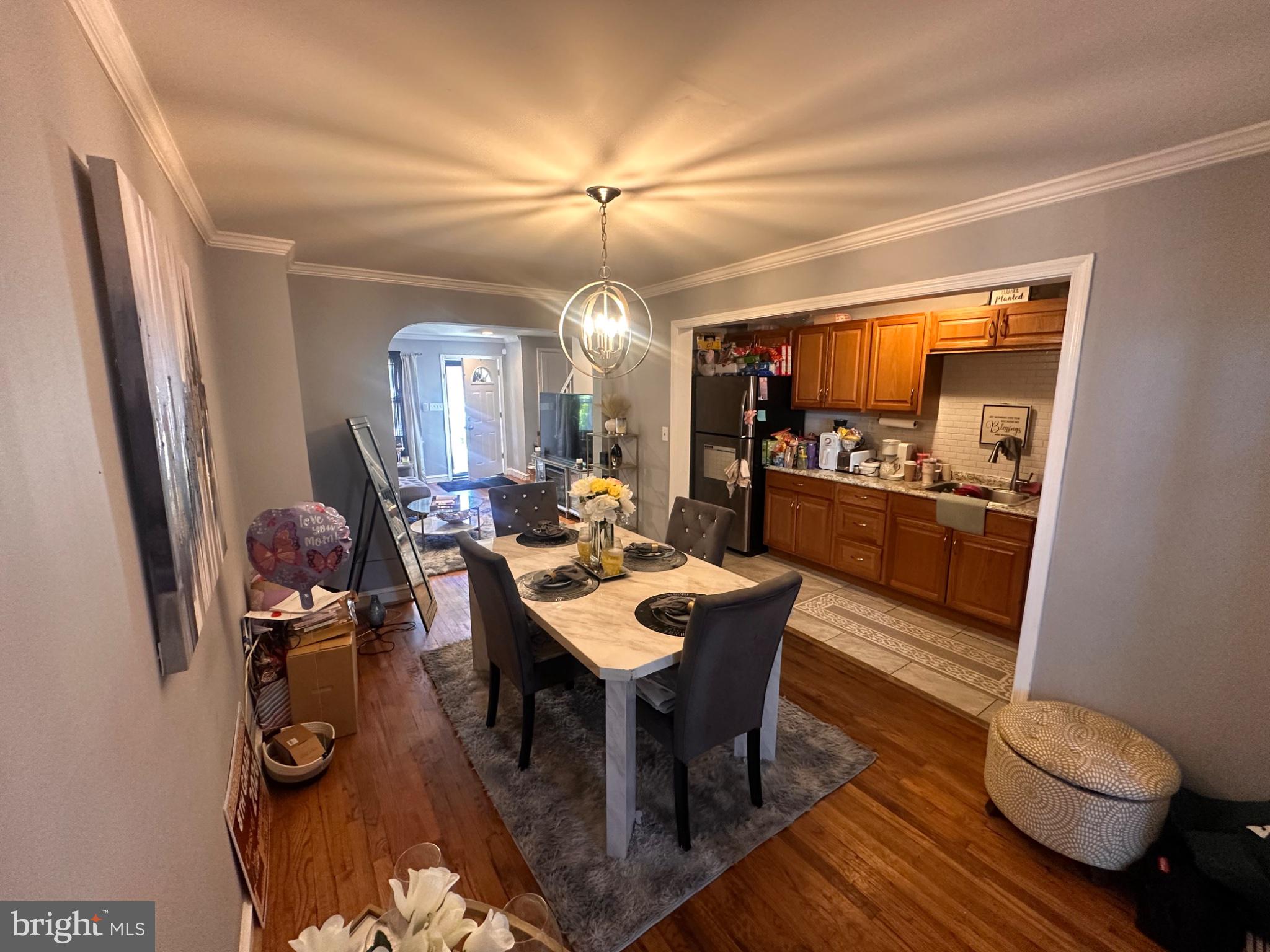 2725 North Rosedale Street Baltimore, MD 21216 - Photo 7 of 21 Inviting dining space with warm tones.