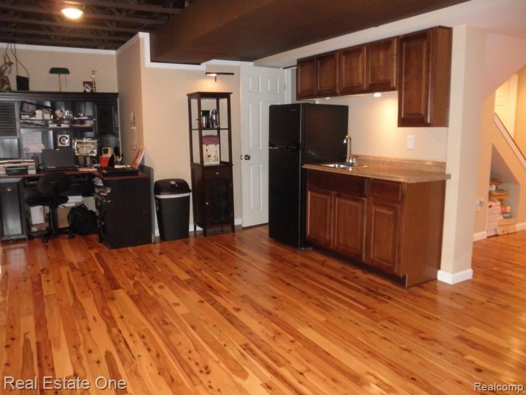 856 Deer Run Lake Road Holly, MI 48442 - Photo 28 of 34 Rec room with wet bar and office area