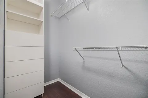 a view of a room with racks on the wall