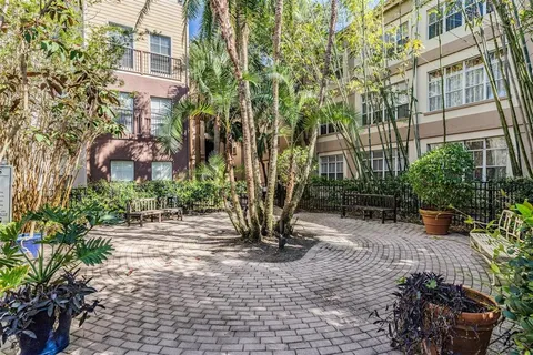 a view of a building with a garden