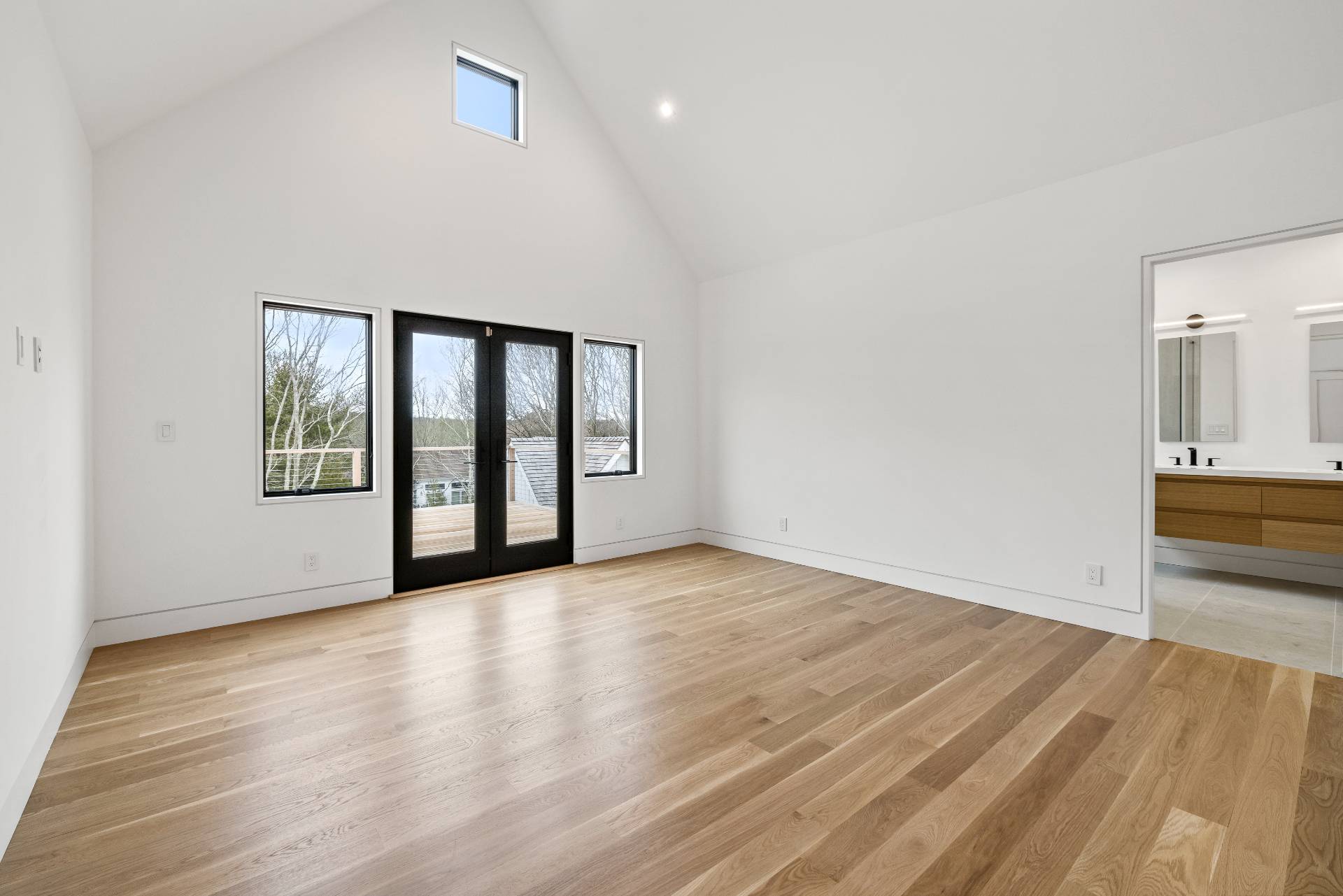 95 Highview Drive Sag Harbor, NY 11963 - Photo 12 of 22 wooden floor in an empty room with a window
