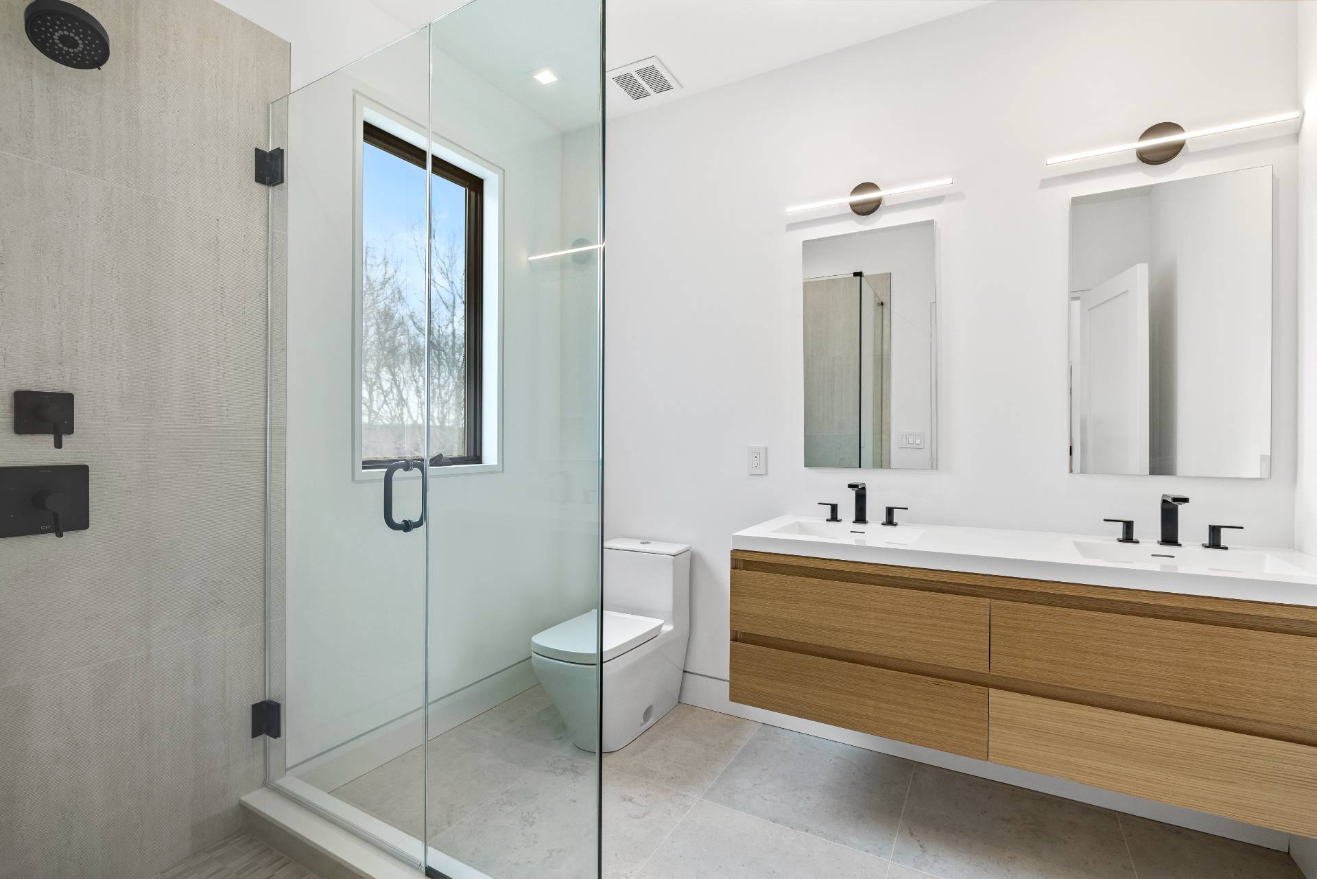 95 Highview Drive Sag Harbor, NY 11963 - Photo 13 of 22 a bathroom with 2 sink toilet and mirror
