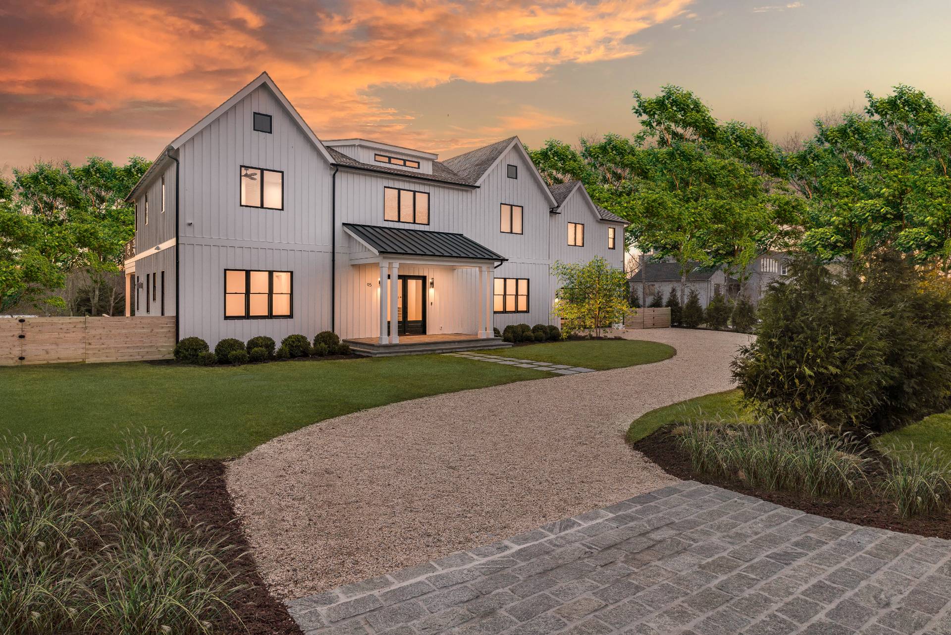 95 Highview Drive Sag Harbor, NY 11963 - Photo 22 of 22 a front view of a house with a yard and trees