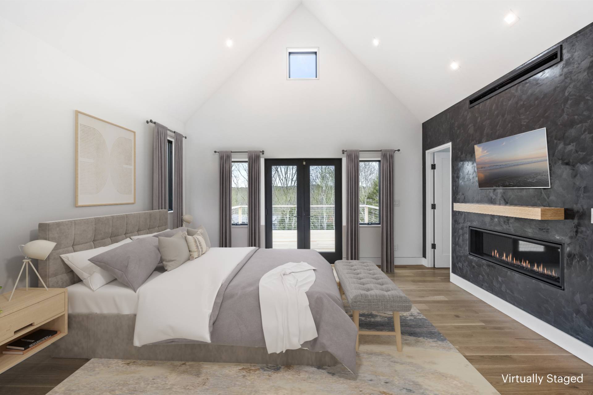 95 Highview Drive Sag Harbor, NY 11963 - Photo 8 of 22 a spacious bedroom with a bed and a fireplace