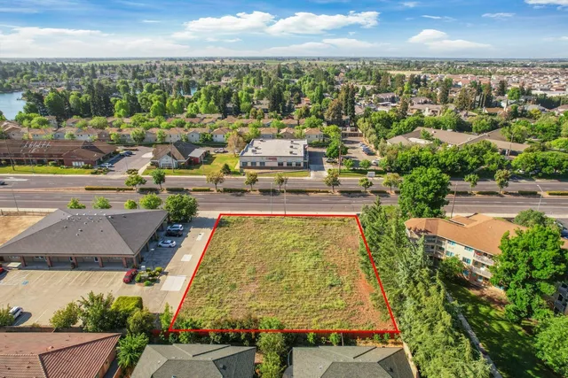 an aerial view of a house with a garden