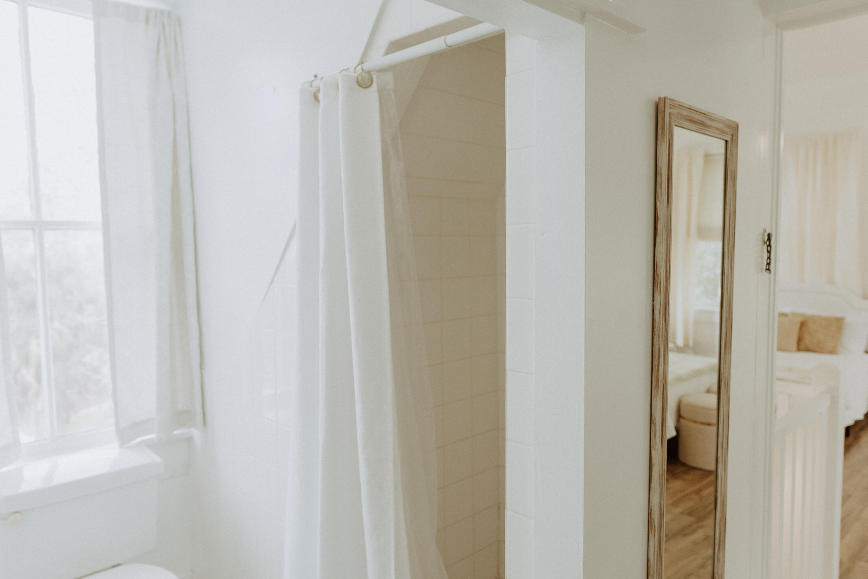 23622 Fifth Avenue Florala, AL 36442 - Photo 15 of 91 a bathroom with a shower and a door