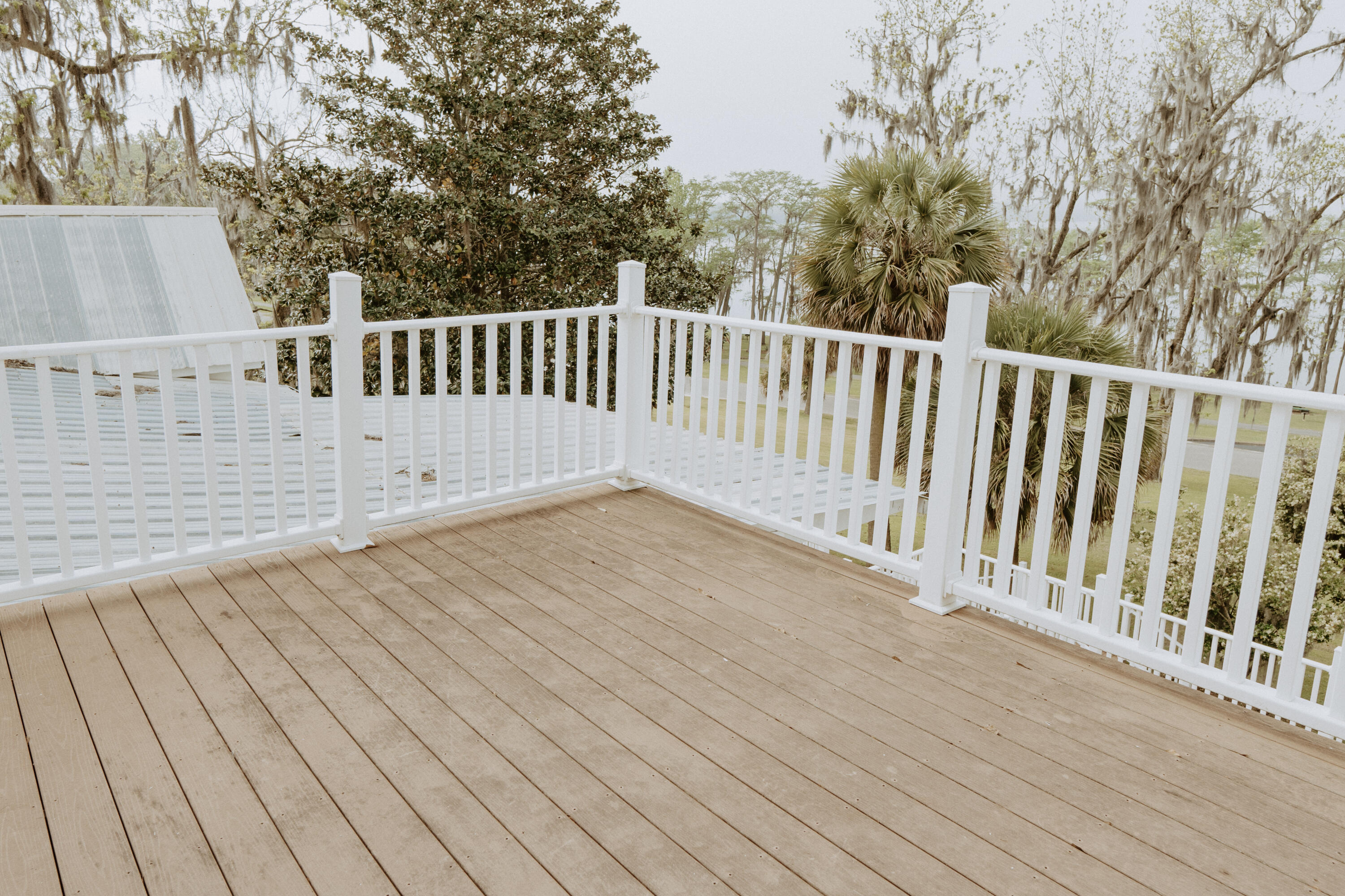 23622 Fifth Avenue Florala, AL 36442 - Photo 23 of 91 a view of a balcony with wooden floor