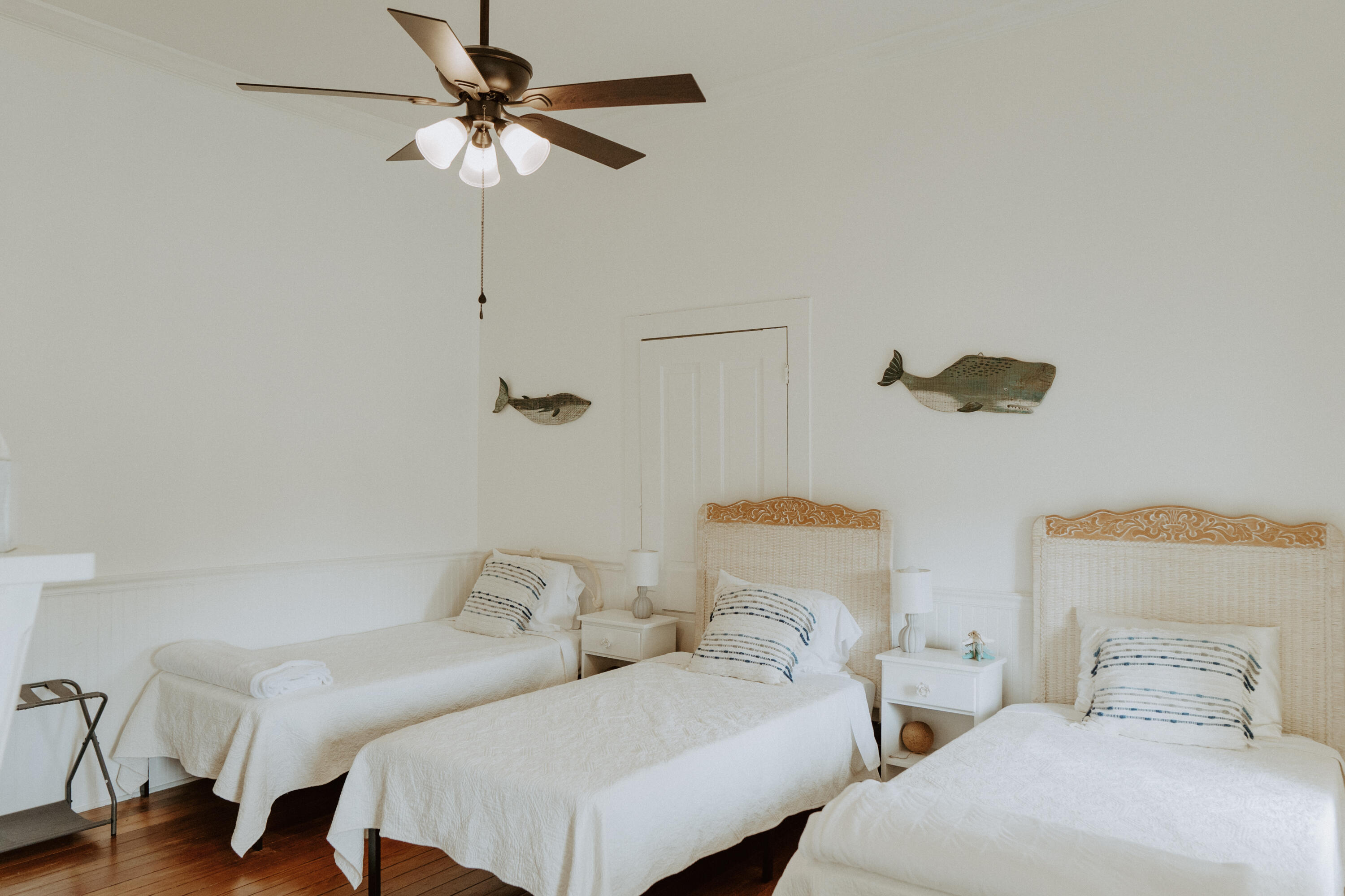 23622 Fifth Avenue Florala, AL 36442 - Photo 32 of 91 a bedroom with two beds and a chandelier