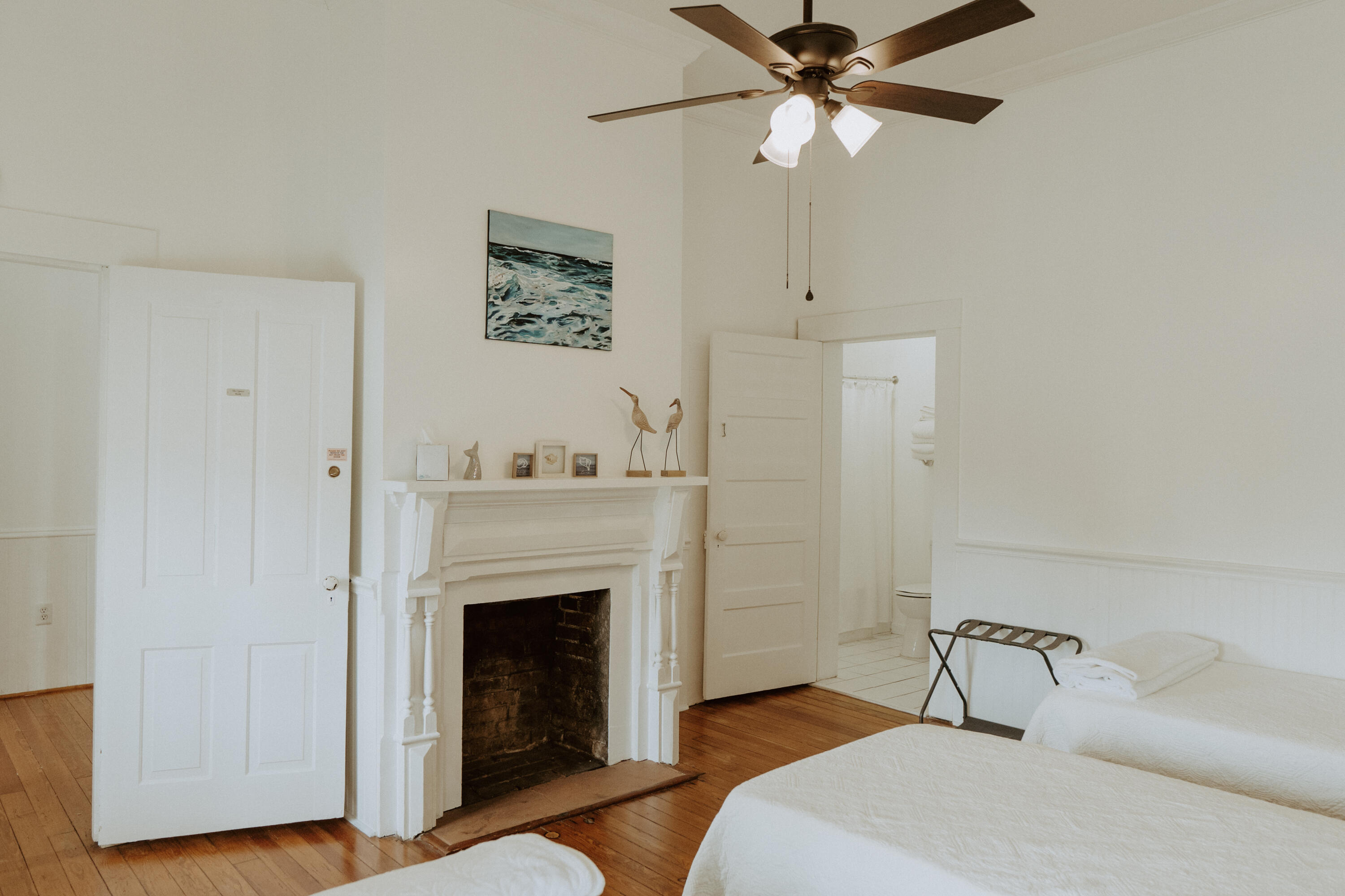 23622 Fifth Avenue Florala, AL 36442 - Photo 34 of 91 a bedroom with a bed and a fireplace
