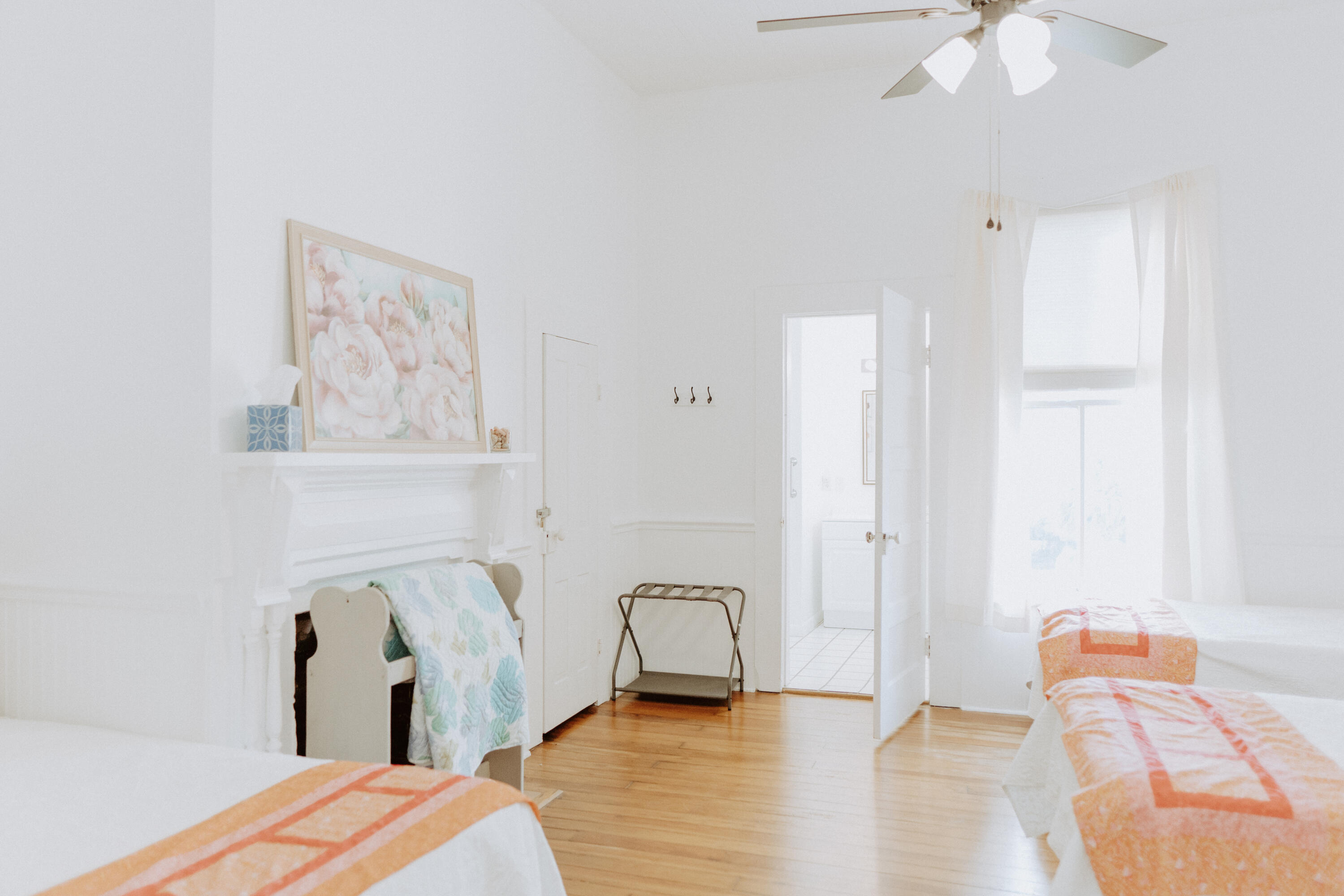 23622 Fifth Avenue Florala, AL 36442 - Photo 38 of 91 a bedroom with two beds and a chandelier
