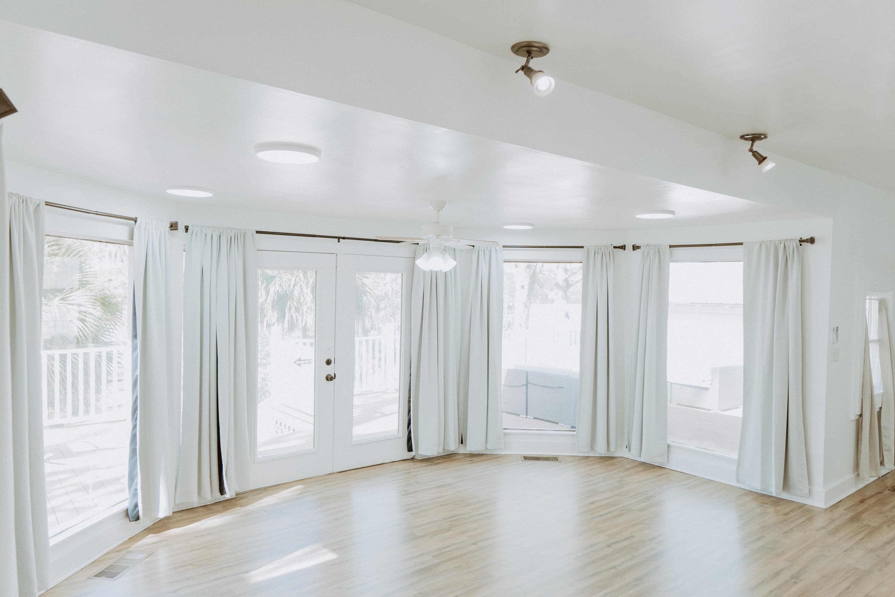 23622 Fifth Avenue Florala, AL 36442 - Photo 53 of 91 a view of an empty room with wooden floor and a window