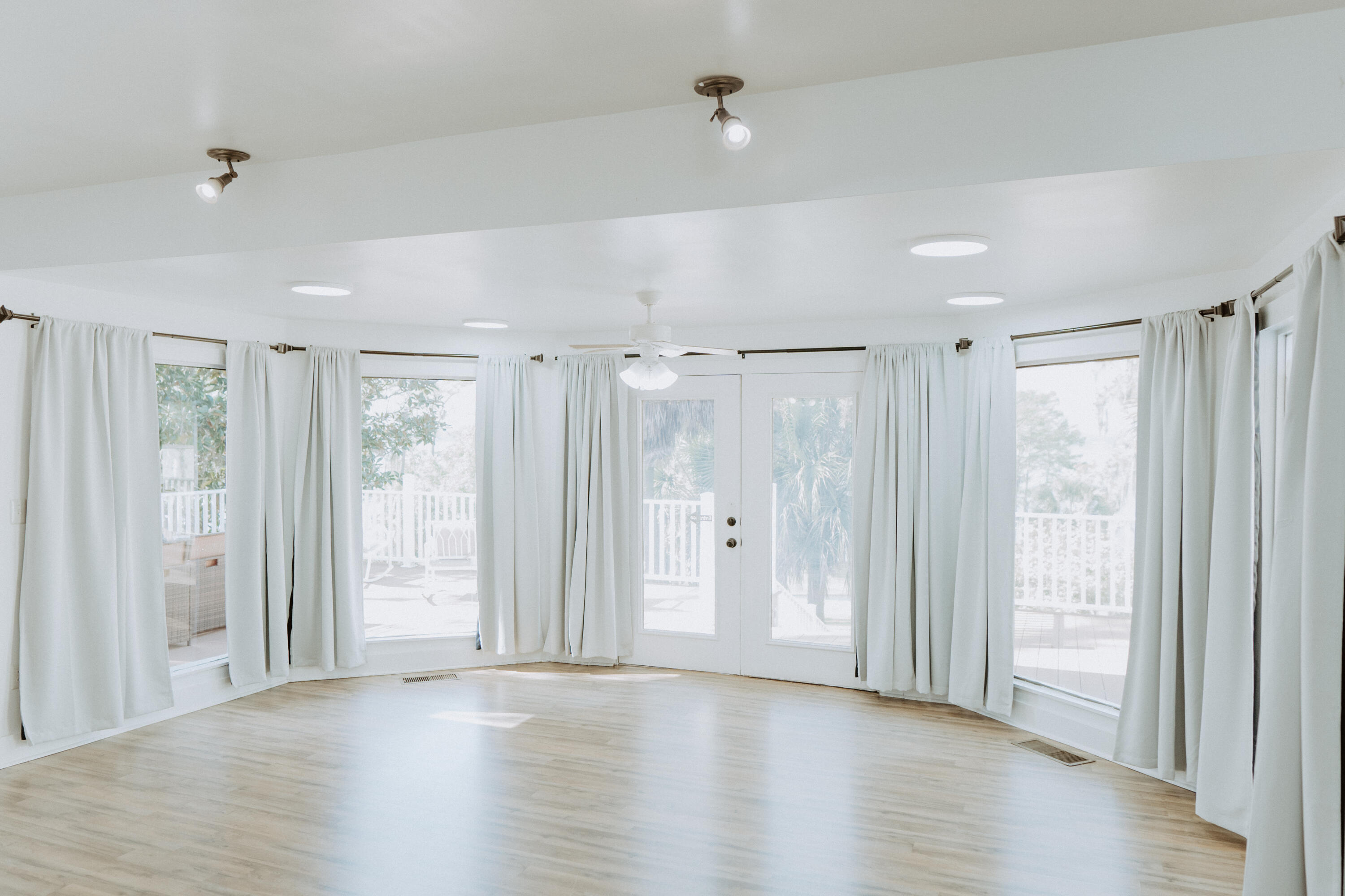 23622 Fifth Avenue Florala, AL 36442 - Photo 54 of 91 a view of an empty room with wooden floor and a window