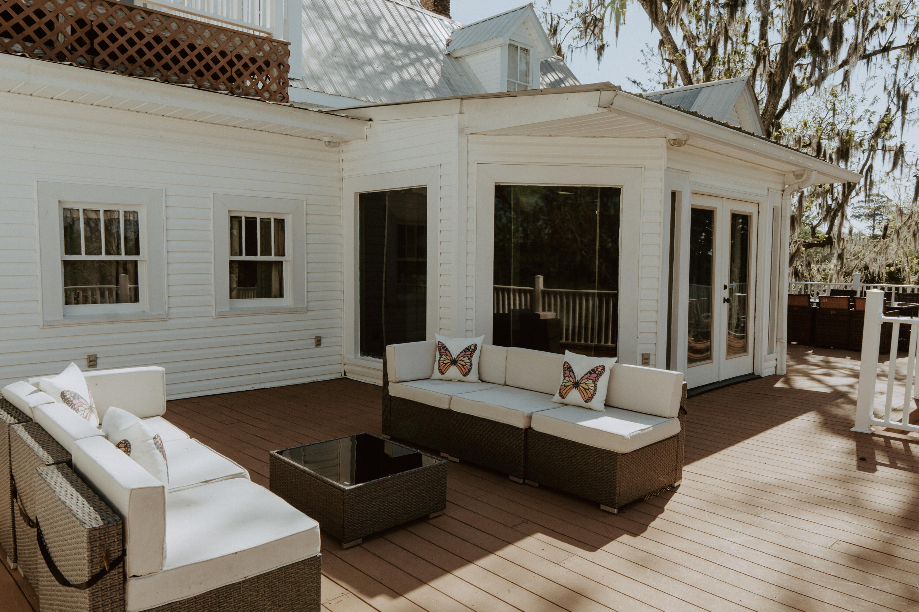 23622 Fifth Avenue Florala, AL 36442 - Photo 57 of 91 a outdoor space with patio the couches and a dining table with wooden floor