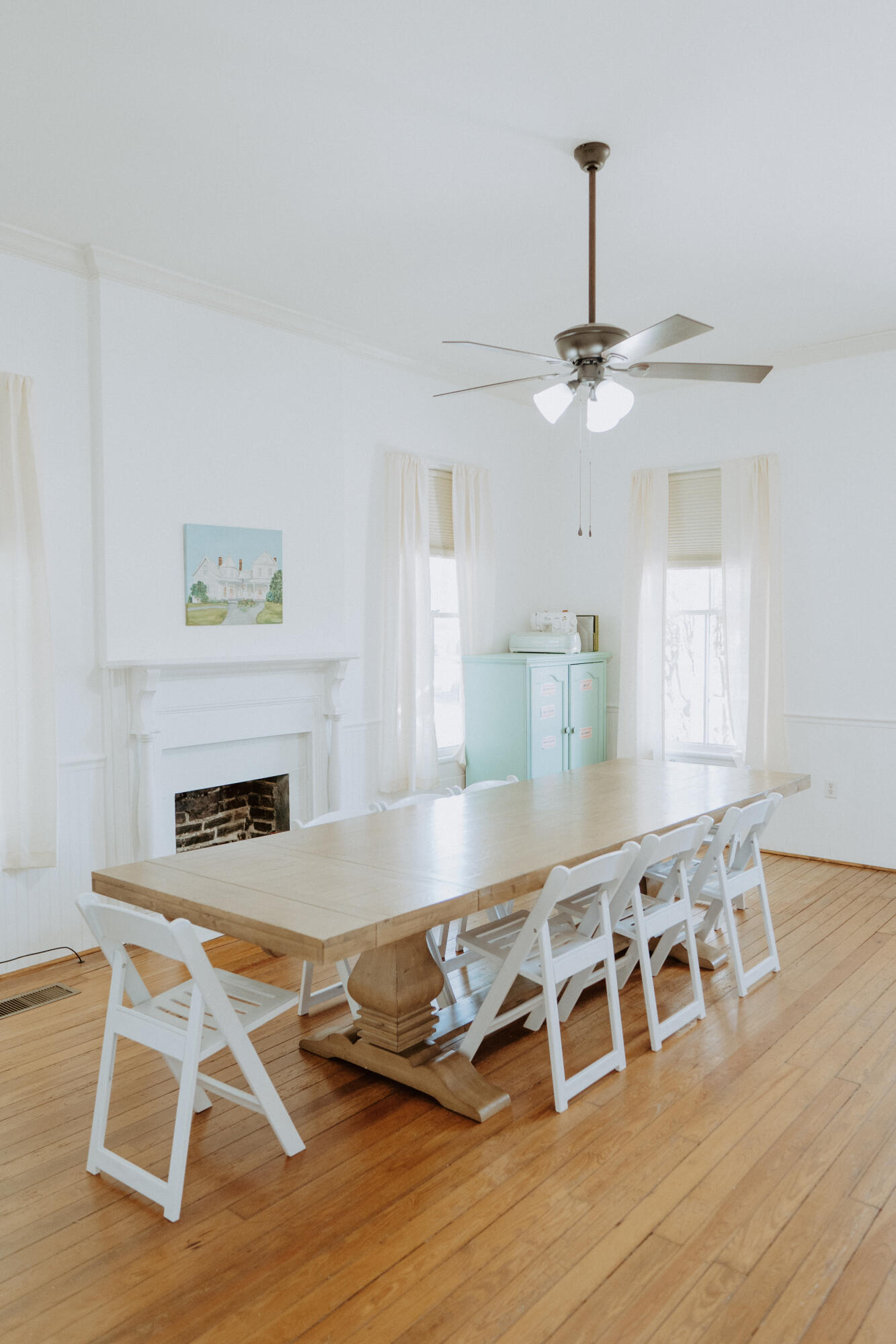 23622 Fifth Avenue Florala, AL 36442 - Photo 70 of 91 a living room with a table chairs and a wooden floor