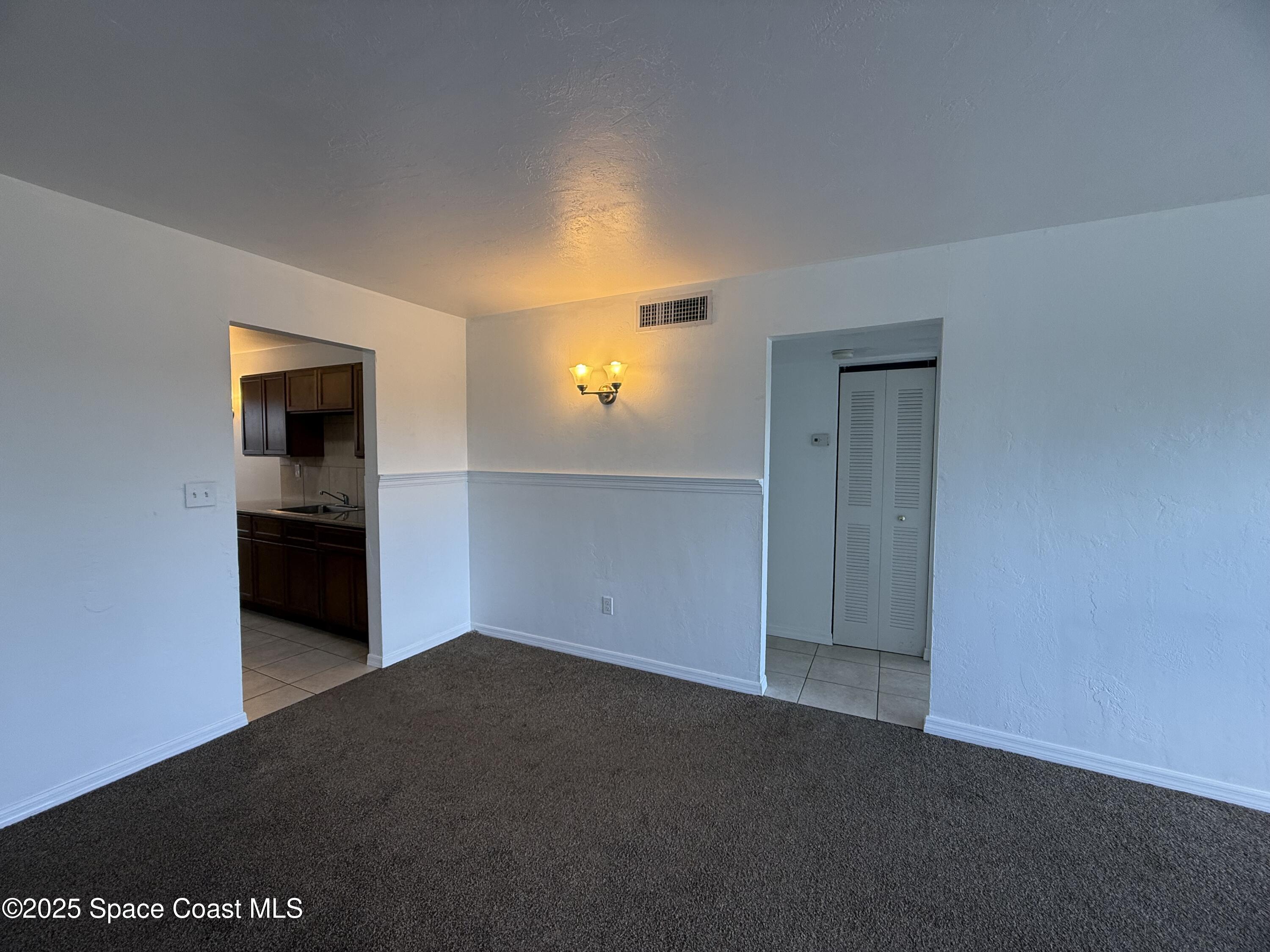 1440 Parkway Drive, Unit 7A Melbourne, FL 32935 - Photo 8 of 27 a view of empty room