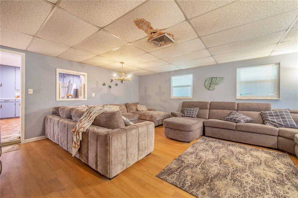 308 Granada Road Auburndale, FL 33823 - Photo 5 of 37 a living room with furniture and a large window