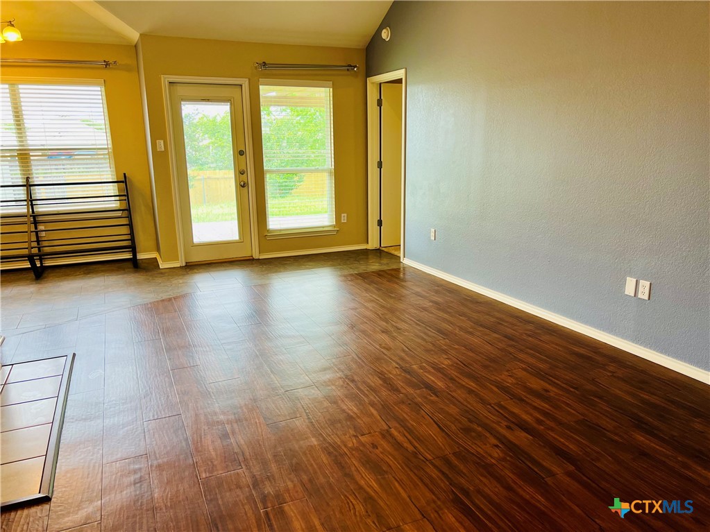 8210 Sunset Trail Temple, TX 76502 - Photo 3 of 15 a view of room with window and hardwood