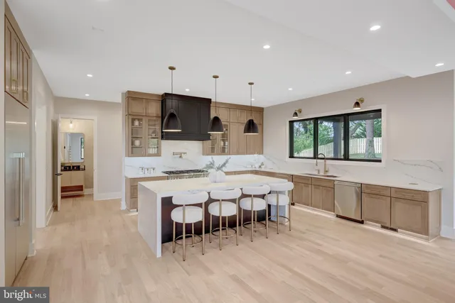 a living room with furniture and windows