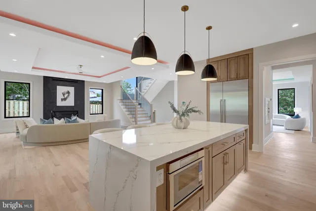 a bedroom with a large bed and a large window