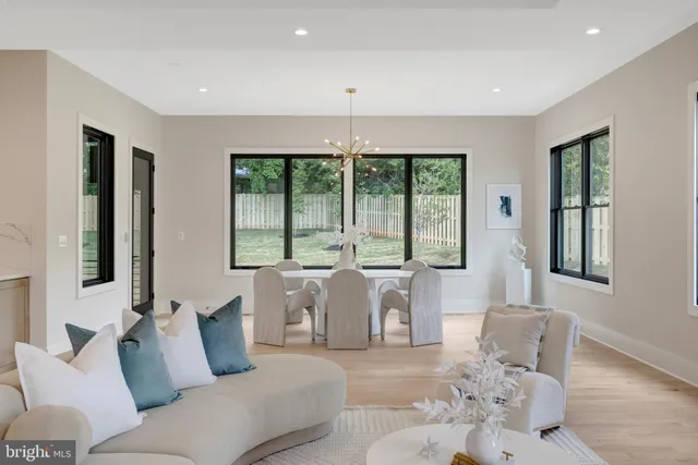 a spacious bathroom with a granite countertop tub sink and mirror