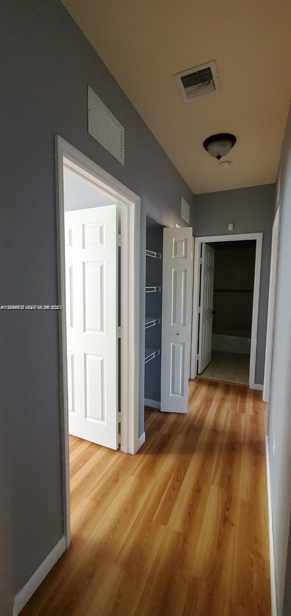 60 Southeast 6th Road Homestead, FL 33030 - Photo 5 of 15 a view of empty room with closet and bathroom