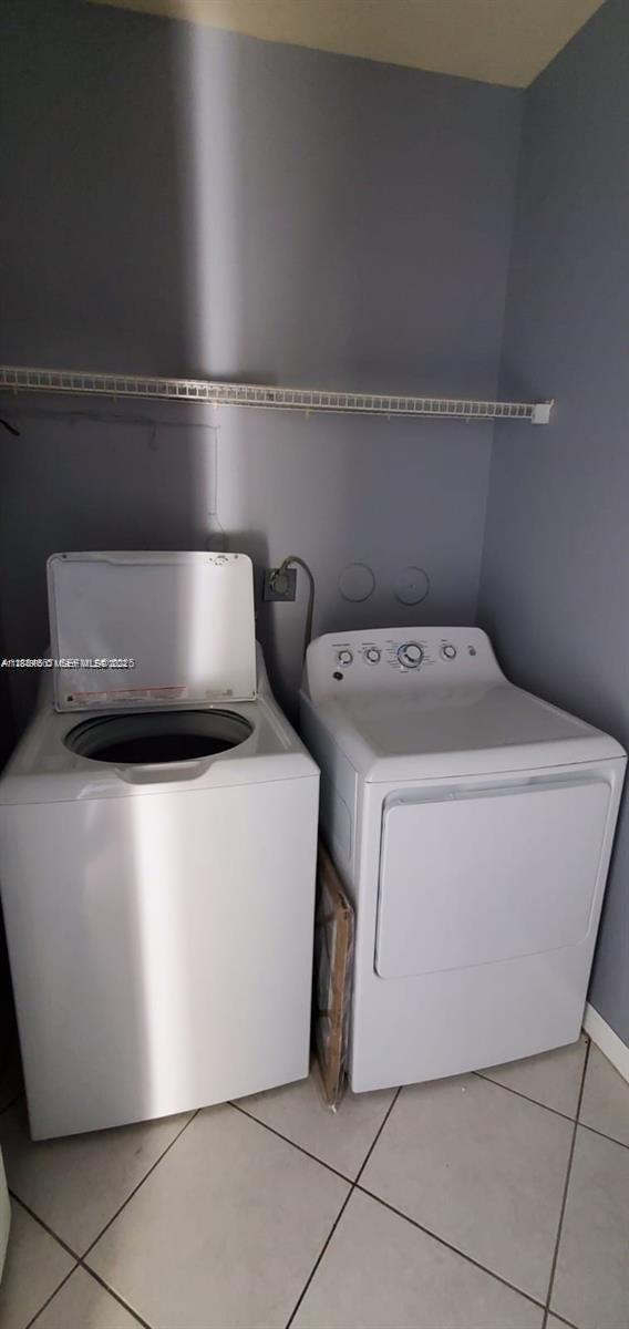 60 Southeast 6th Road Homestead, FL 33030 - Photo 9 of 15 a utility room with dryer and washer