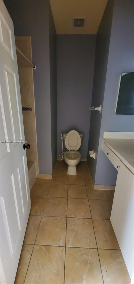 60 Southeast 6th Road Homestead, FL 33030 - Photo 10 of 15 a bathroom with a toilet and a shower