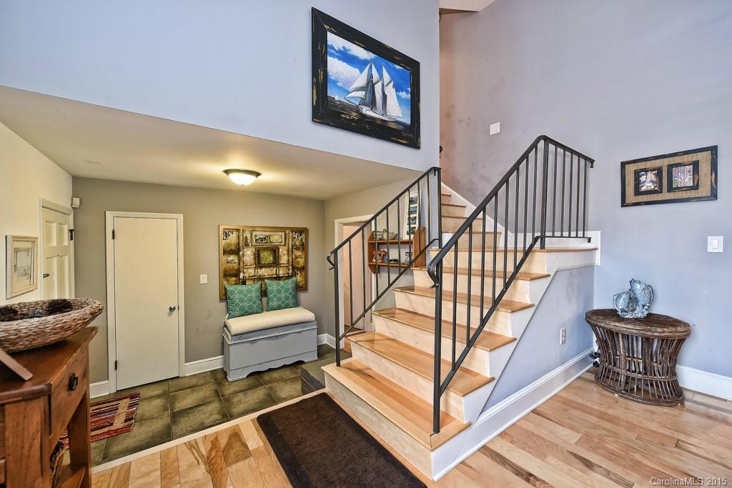 646 Sandridge Road Charlotte, NC 28210 - Photo 15 of 24 a living room with furniture and a wooden floor
