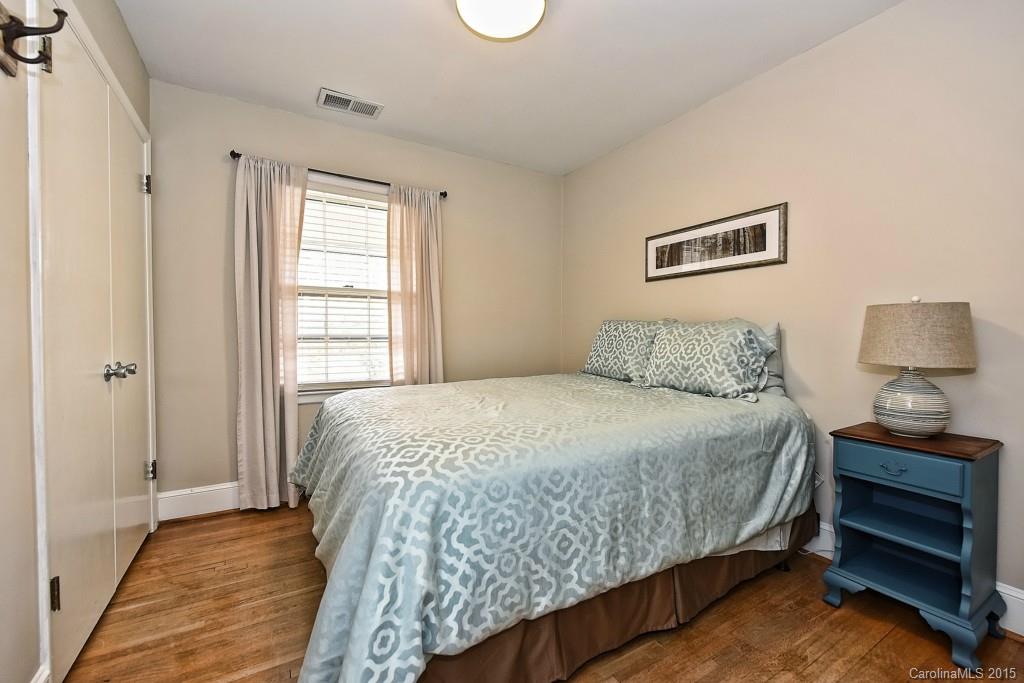 646 Sandridge Road Charlotte, NC 28210 - Photo 19 of 24 a bedroom with a bed and a window