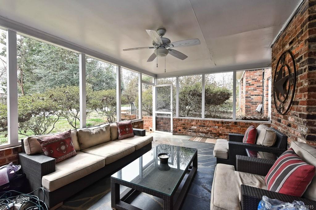 646 Sandridge Road Charlotte, NC 28210 - Photo 22 of 24 a living room with furniture and a large window