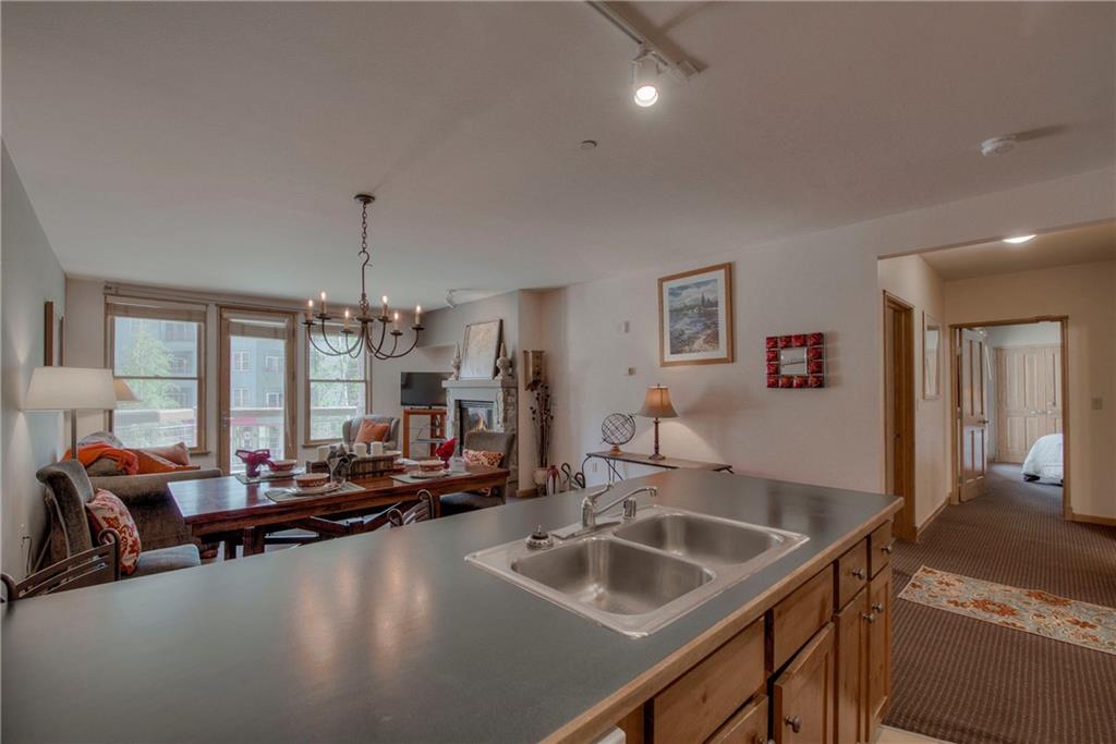 129 River Run Road, Unit 8062 Dillon, CO 80435 - Photo 12 of 35 a kitchen view with a sink and living room view