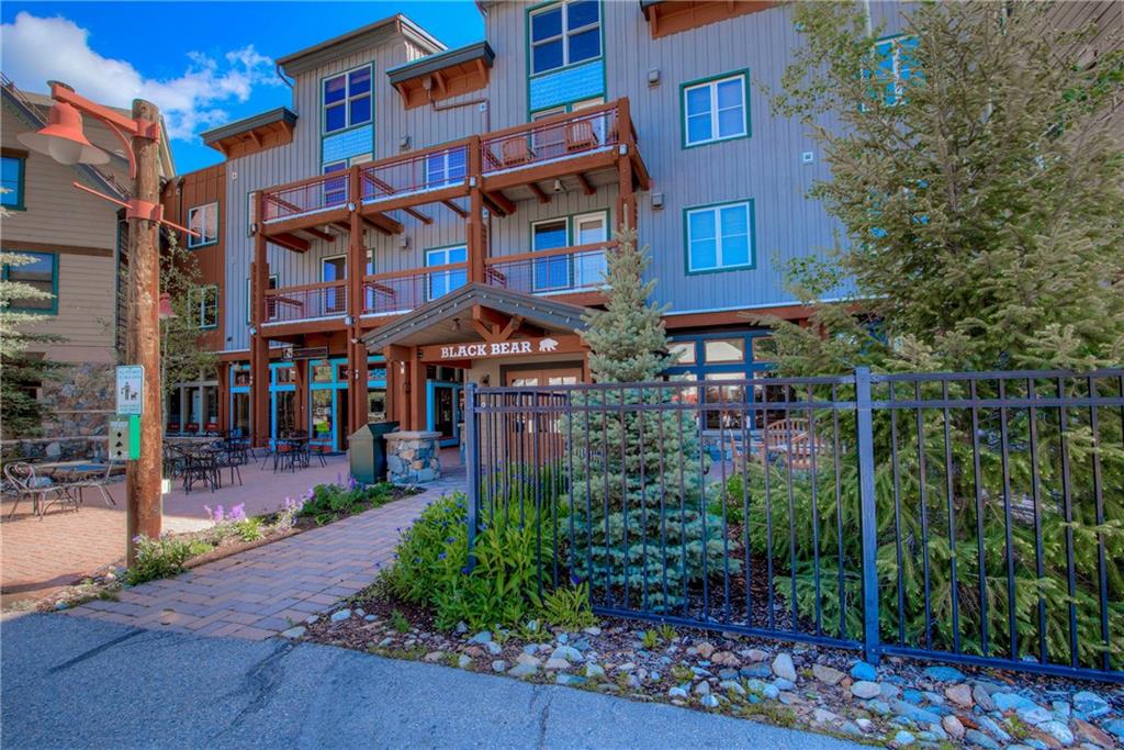 129 River Run Road, Unit 8062 Dillon, CO 80435 - Photo 13 of 35 a front view of a multi story building with yard