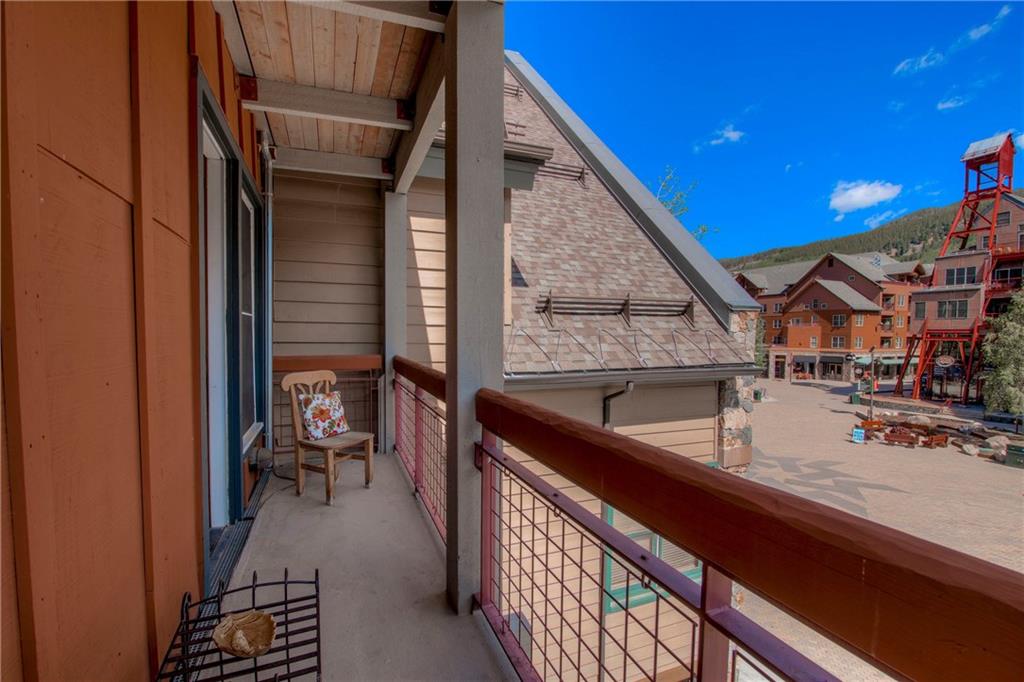 129 River Run Road, Unit 8062 Dillon, CO 80435 - Photo 3 of 35 a backyard of a house with table and chairs