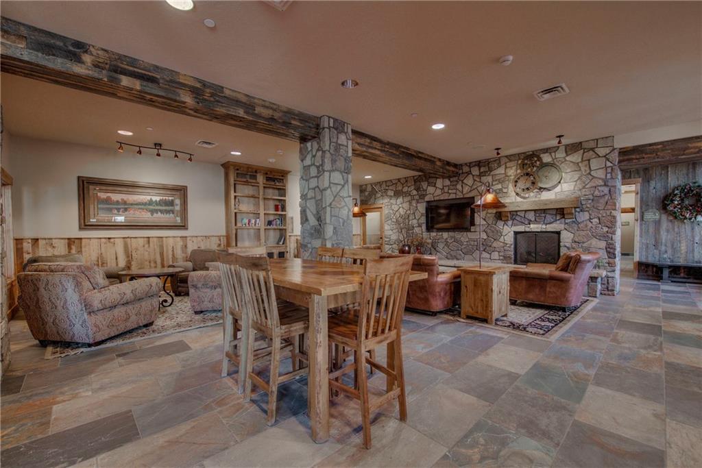 129 River Run Road, Unit 8062 Dillon, CO 80435 - Photo 22 of 35 a living room with lots of furniture and kitchen view