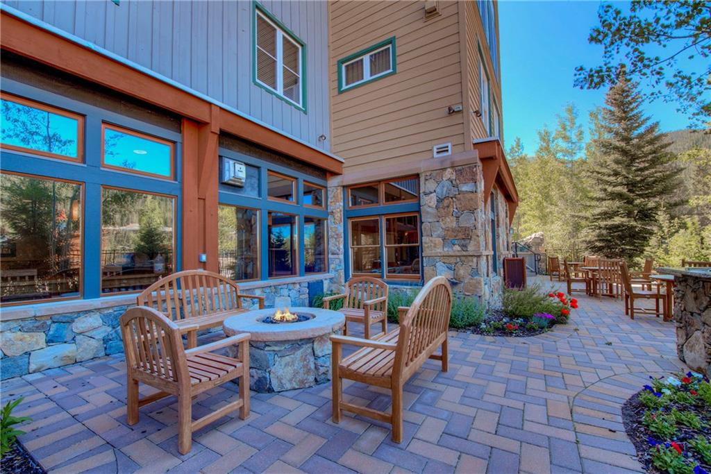 129 River Run Road, Unit 8062 Dillon, CO 80435 - Photo 28 of 35 a view of a house with backyard sitting area and garden