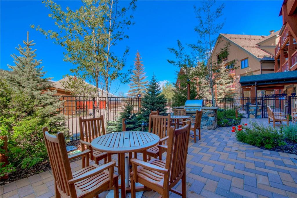 129 River Run Road, Unit 8062 Dillon, CO 80435 - Photo 30 of 35 a view of a table and chairs in patio