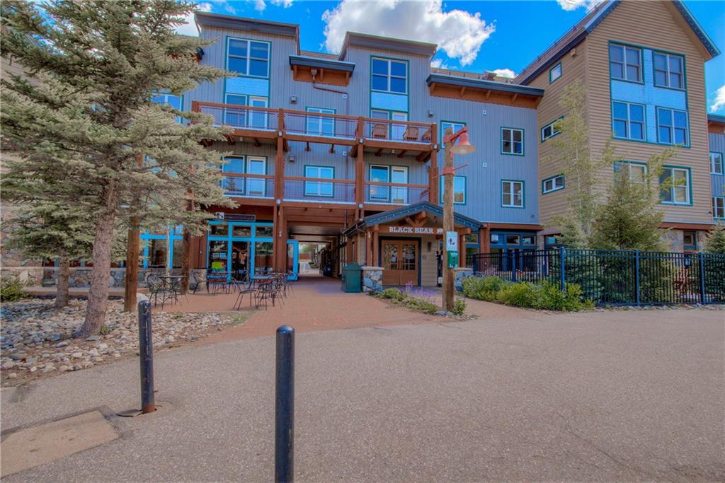 129 River Run Road, Unit 8062 Dillon, CO 80435 - Photo 34 of 35 a under a building with retail shops and traffic signal