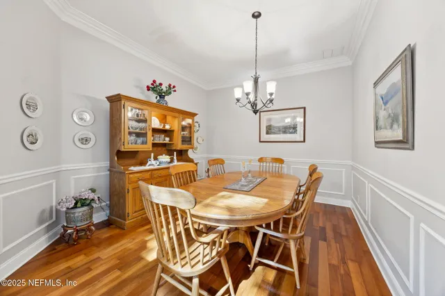 a bathroom with a sink mirror and toilet