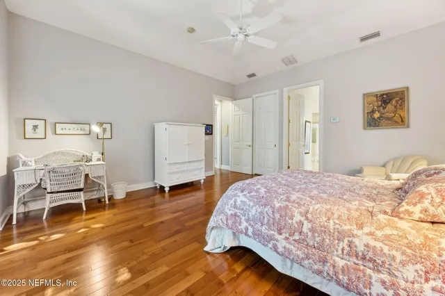 a bathroom with a sink a mirror and a shower