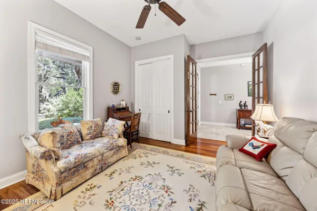 a living room with furniture and a table